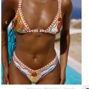 Bydee Australia beaded swimsuit bottoms in size small. New with tags.